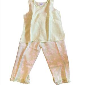 On White ruffled lime green top and elastic waist pants 100% cotton
